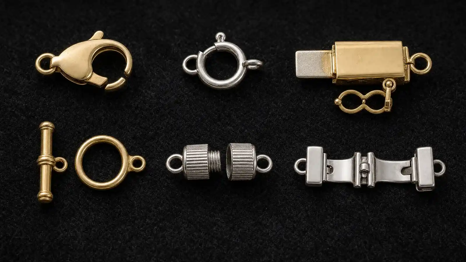 Six bracelet clasps shown open on dark charcoal velvet — a lobster claw, spring ring, box clasp with figure-eight safety catch, T-bar toggle, unscrewed barrel clasp and a fold-over deployant clasp